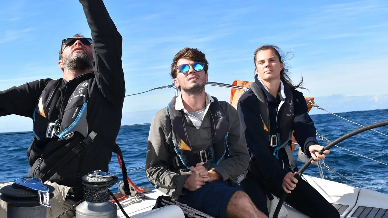 Skipper teaching crew on a yacht delivery