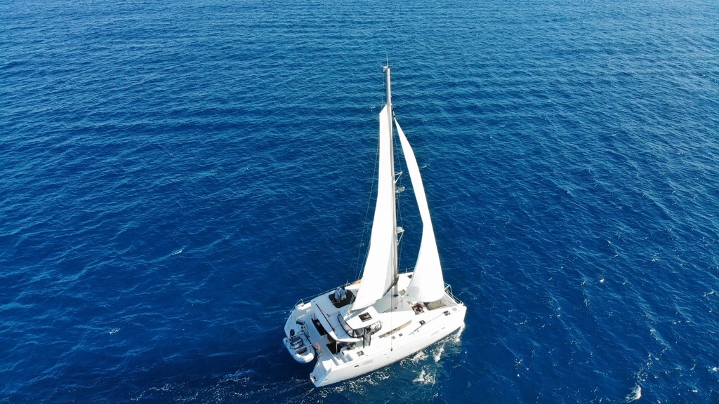 Leopard catamaran sailing in the Caribbean doing a yacht delivery